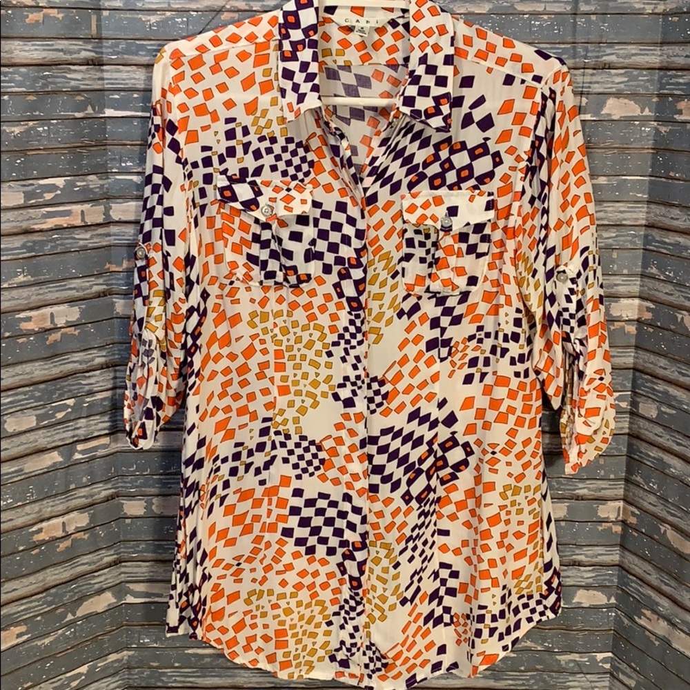 CAbi 3/4 sleeve blouse with hidden buttons.